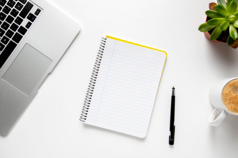 top-view-desk-with-notebook-laptop
